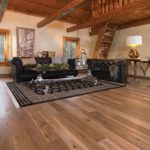 rustic-living-room-with-hardwood-flooring-crown-molding-and-wallpaper-i_g-IS5uaiajwmxpy71000000000-1grSp